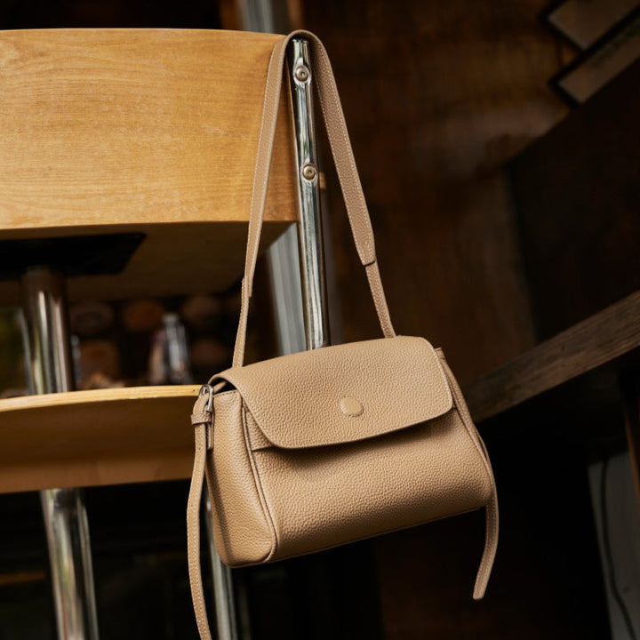 The Lychee Grain Genuine Leather Flap Crossbody Bag with Adjustable Strap