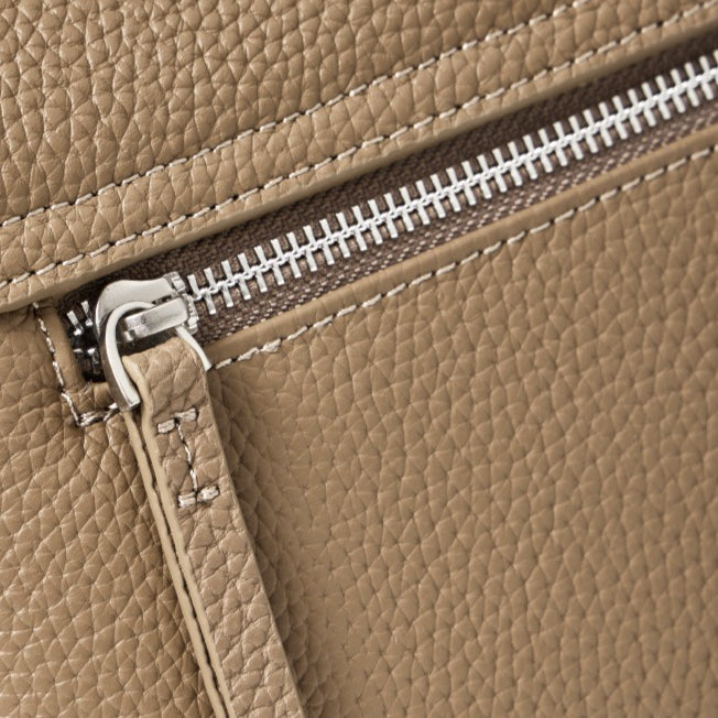 The Lychee Grain Genuine Leather Flap Crossbody Bag with Adjustable Strap