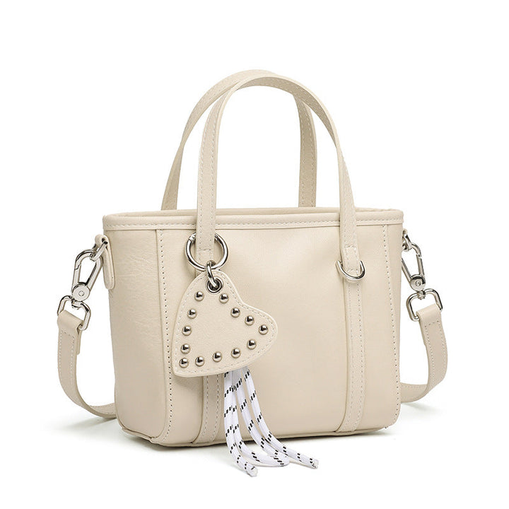 Sculpted Genuine Leather Mini Tote Crossbody Bag with Signature Heart Charm
