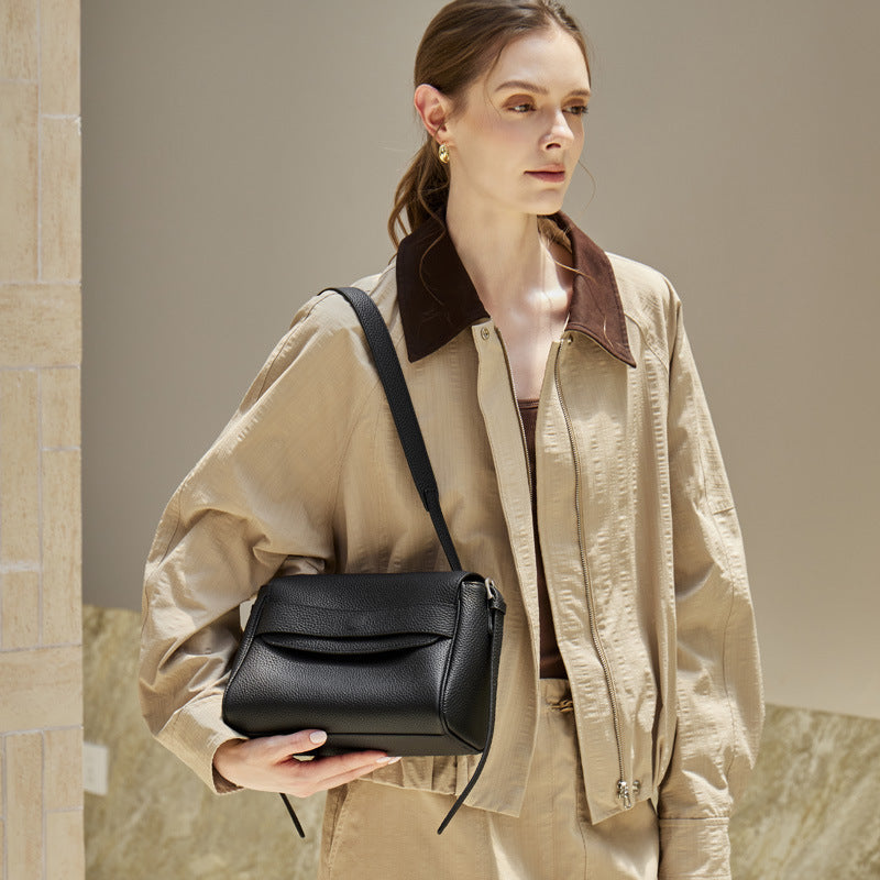 The Lychee Grain Genuine Leather Flap Crossbody Bag with Adjustable Strap