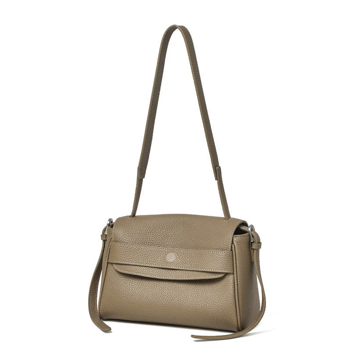 The Lychee Grain Genuine Leather Flap Crossbody Bag with Adjustable Strap