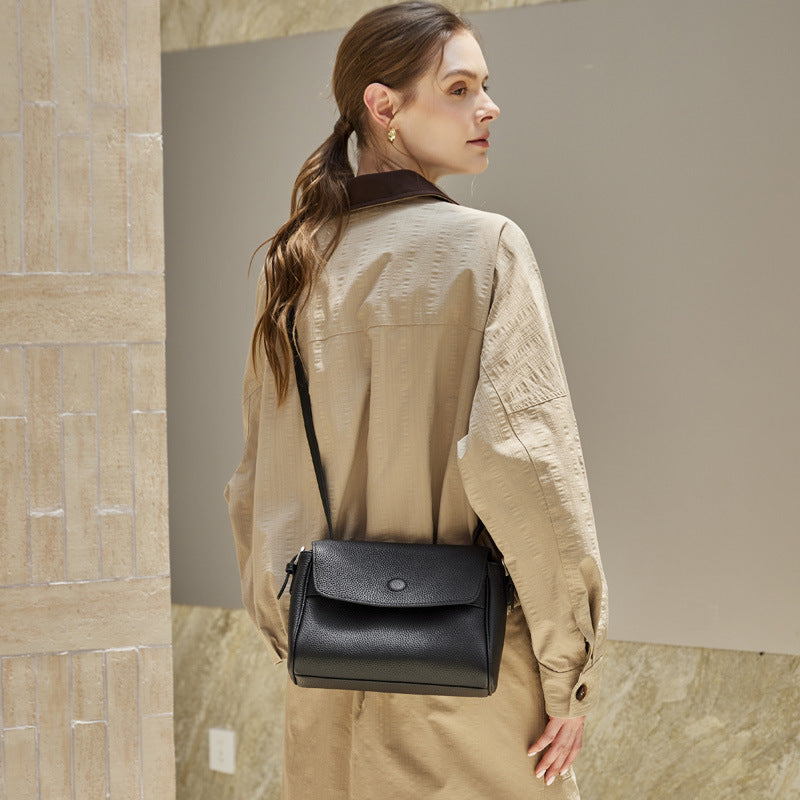 The Lychee Grain Genuine Leather Flap Crossbody Bag with Adjustable Strap