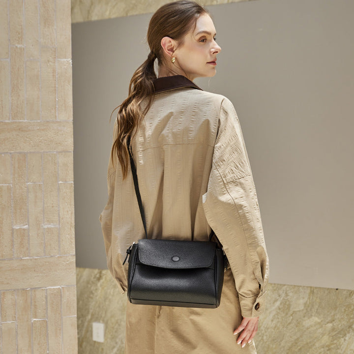 The Lychee Grain Genuine Leather Flap Crossbody Bag with Adjustable Strap